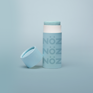 Noz Sunscreen with blue packaging and blue background.